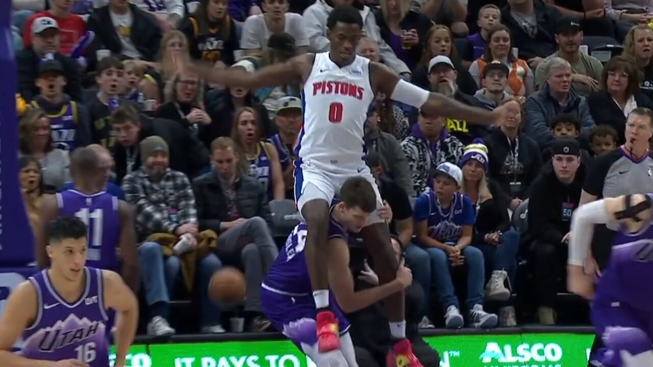 Pistons’ Duren takes a ride on Jazz’s Kessler’s back after the power jam